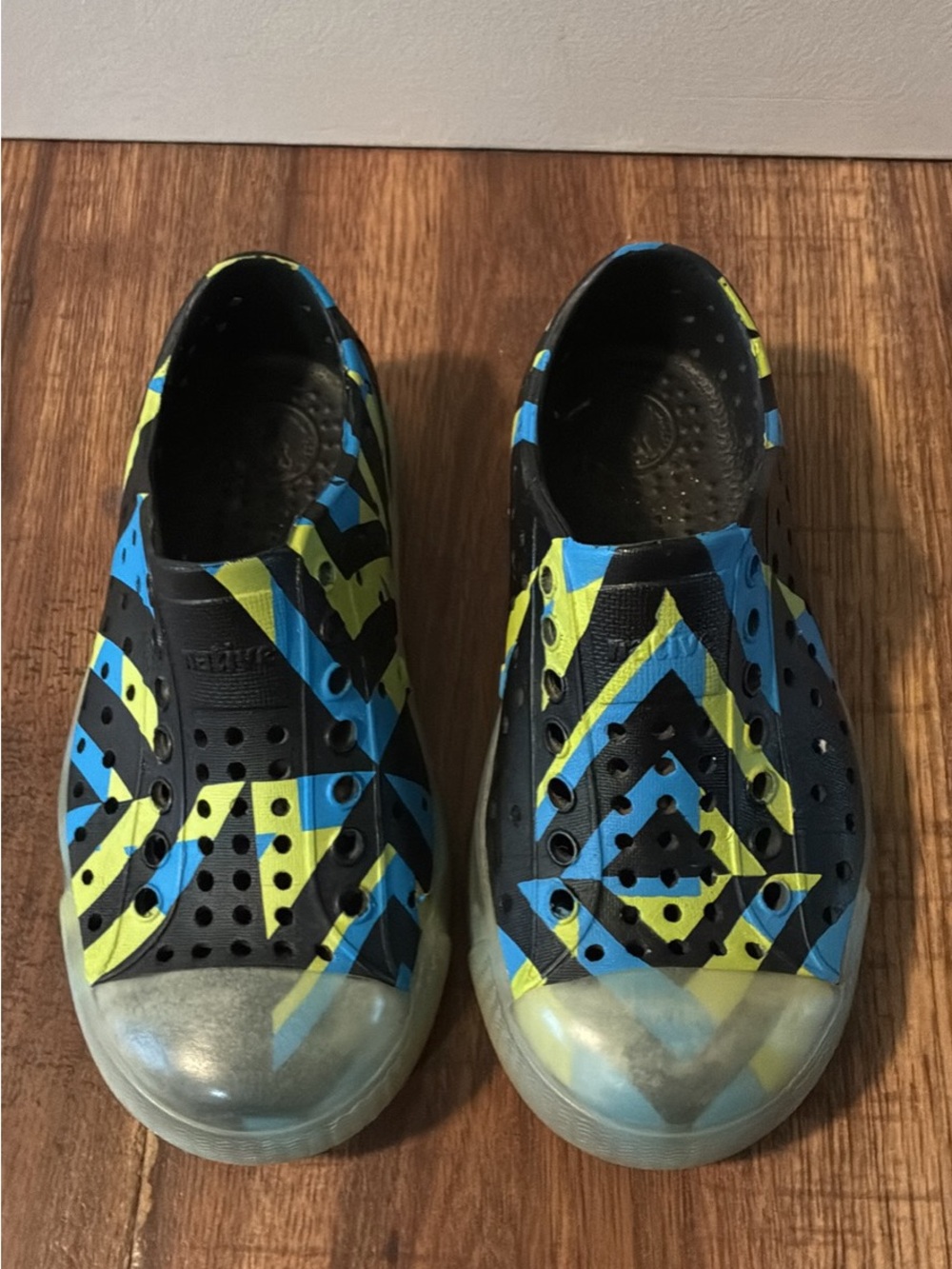 Native Kids Slip-On Water Shoes in Black, Blue & Yellow Geometric